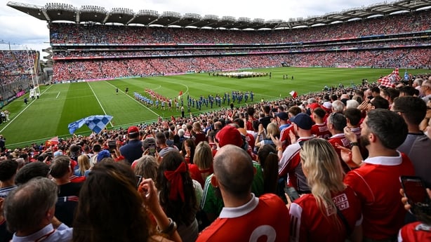 5 July 2025; Players from both sides march behind the band before the GAA Hurling All-Ireland Senior Championship semi-final match between Cork and Dublin at Croke Park in Dublin. Photo by David Fitzgerald/Sportsfile