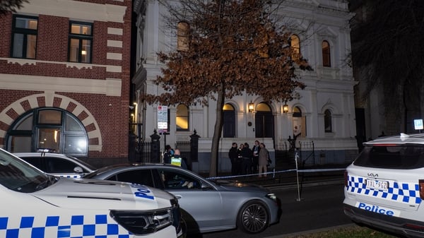 MELBOURNE, VICTORIA, AUSTRALIA - 2025/07/04: Police officers are seen collecting evidence at the synagogue which was the scene of an arson attack. Police declared a crime scene after a suspected arson attempt at East Melbourne synagogue. While the front d