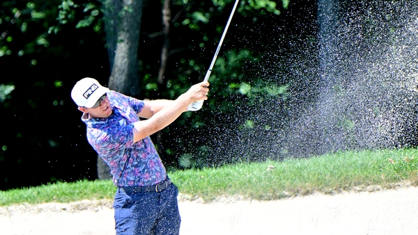 Golfer Seamus Power hits out of the rough on the approach to the #6 hole during the third round of the John Deere PGA Golf Classic on July 05, 2025, at TPC Deere Run in Silvis,IL.