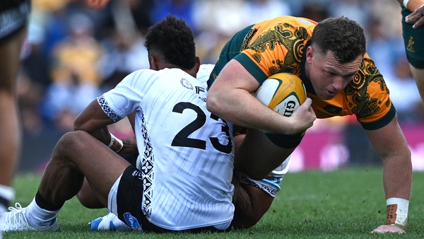 Angus Bell of Australia is tackled by Sireli Maqala of Fij during the International Test match between Australia Wallabies and Fiji at McDonald Jones Stadium on July 06, 2025 in Newcastle, Australia.