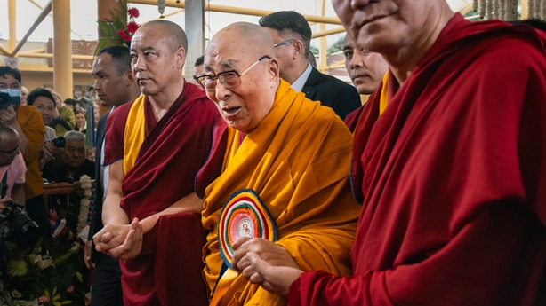 DHARAMSHALA, INDIA - JULY 06: The Tibetan spiritual leader, the Dalai Lama, greets the audience to celebrate his 90th birthday at Tsuglagkhang, the Dalai Lama Temple, on July 06, 2025 in Dharamsala, India. His Holiness the Dalai Lama celebrates his 90th birthday in July 2025, marking a milestone wit