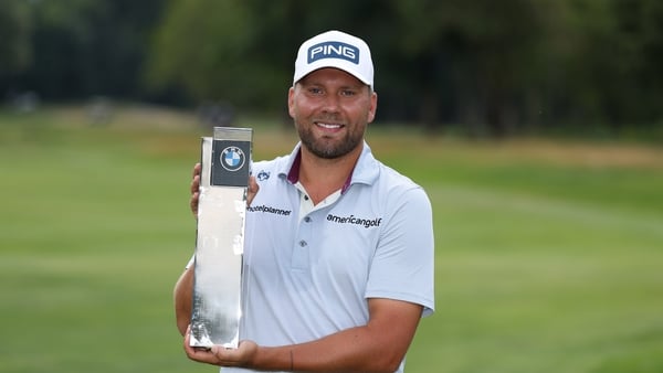 MUNICH, GERMANY - JULY 06: Daniel Brown of England poses with the trophy following victory of the BMW International Open on day four of the BMW International Open 2025 at Golfclub Munchen Eichenried on July 06, 2025 in Munich, Germany. (Photo by Richard H