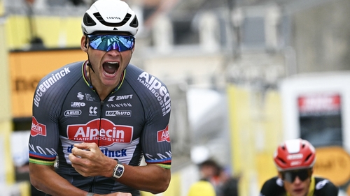 Mathieu van der Poel cycles to the finish line to win the second stage