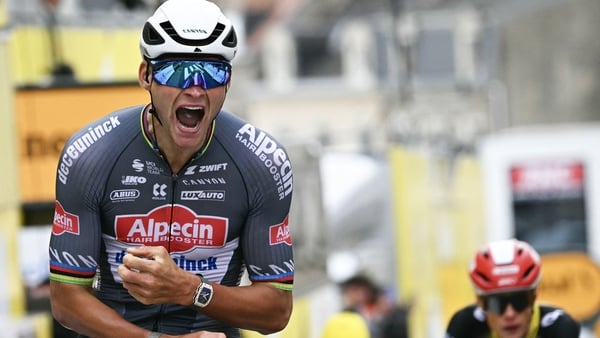 Alpecin - Deceuninck team's Dutch rider Mathieu van der Poel cycles to the finish line to win the 2nd stage of the 112th edition of the Tour de France cycling race, 209.1 km between Lauwin-Planque and Boulogne-sur-Mer, Northern France, on July 6, 2025.