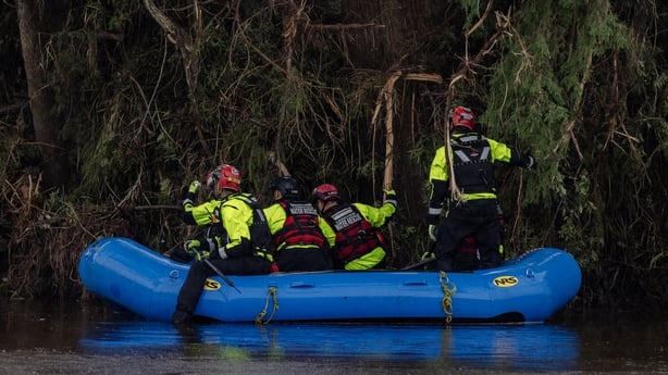 HUNT, TEXAS - JULY 6: Search and recovery workers dig through debris looking for any survivors or remains of people swept up in the flash flooding at Camp Mystic on July 6, 2025 in Hunt, Texas. Heavy rainfall caused flooding along the Guadalupe River in central Texas with multiple fatalities reporte