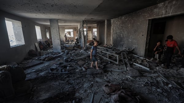GAZA CITY, GAZA - JULY 07: Palestinians inspect the damaged building of the Al-Rimal Clinic in Gaza City, Gaza after an Israeli airstrike targeted the facility, which was sheltering displaced civilians and is affiliated with the Palestinian Ministry of He