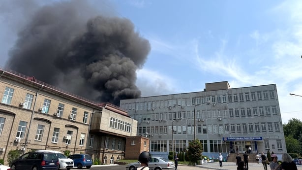 A plume of black smoke rises over the area where a Russian attack drone lands near the Zaporizhzhia Regional Territorial Recruitment Centre in Zaporizhzhia, Ukraine, on July 7, 2025. (Photo by Dmytro Smolienko/Ukrinform) NO USE RUSSIA. NO USE BELARUS. (Photo by Ukrinform/NurPhoto via Getty Images)