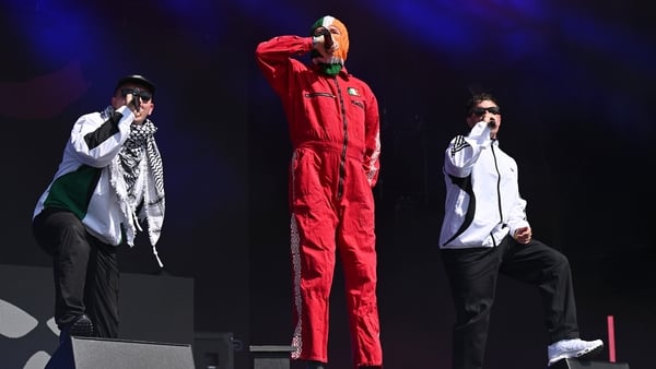 GLASTONBURY, ENGLAND - JUNE 28: Mo Chara, DJ Provaí and Móglaí Bap of Kneecap during day four of Glastonbury festival 2025 at Worthy Farm, Pilton on June 28, 2025 in Glastonbury, England. Established by Michael Eavis in 1970, Glastonbury has grown into th