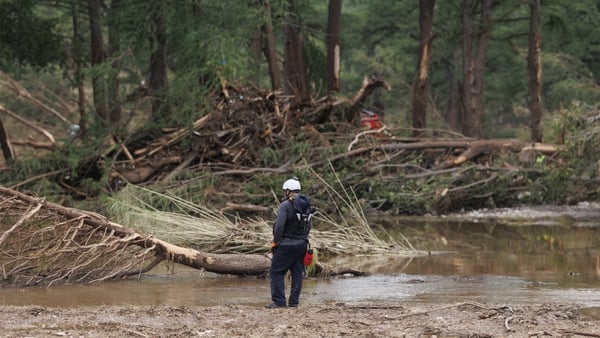 INGRAM, TEXAS - JULY 7: Search and rescue crews continue to look for missing persons after devastating floods hit near the Guadalupe River in Ingram, Texas on July 7, 2025. The death toll from flash floods in the US state of Texas has risen to 91, with th
