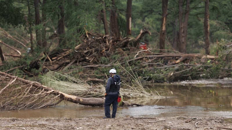 Search-and-rescue personnel continued their operation while facing the potential of more heavy rains