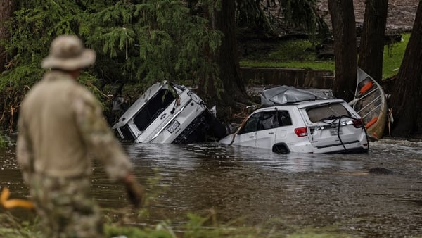 HUNT, TEXAS - JULY 6: Search and rescue workers search near debris looking for any survivors or remains of people swept up in the flash flooding on July 6, 2025 in Hunt, Texas. Heavy rainfall caused flooding along the Guadalupe River in central Texas with