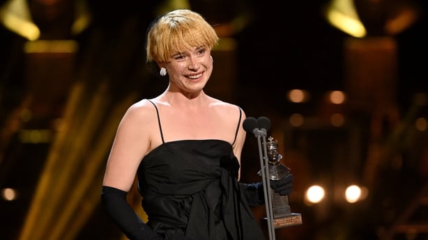 LONDON, ENGLAND - APRIL 10: (EXCLUSIVE COVERAGE) Jessie Buckley accepts the award for Best Actress in a Musical for "Cabaret" on stage during The Olivier Awards 2022 with MasterCard at the Royal Albert Hall on April 10, 2022 in London, England. (Photo by Jeff Spicer/Getty Images for SOLT)