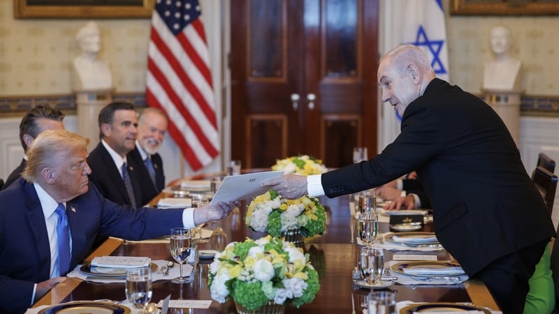 President Donald Trump and Israeli Prime Minister Benjamin Netanyahu meet during a dinner at the White House in Washington