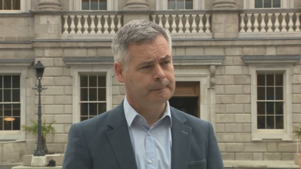 Pearse Doherty speaking on the pinth at Leinster House.