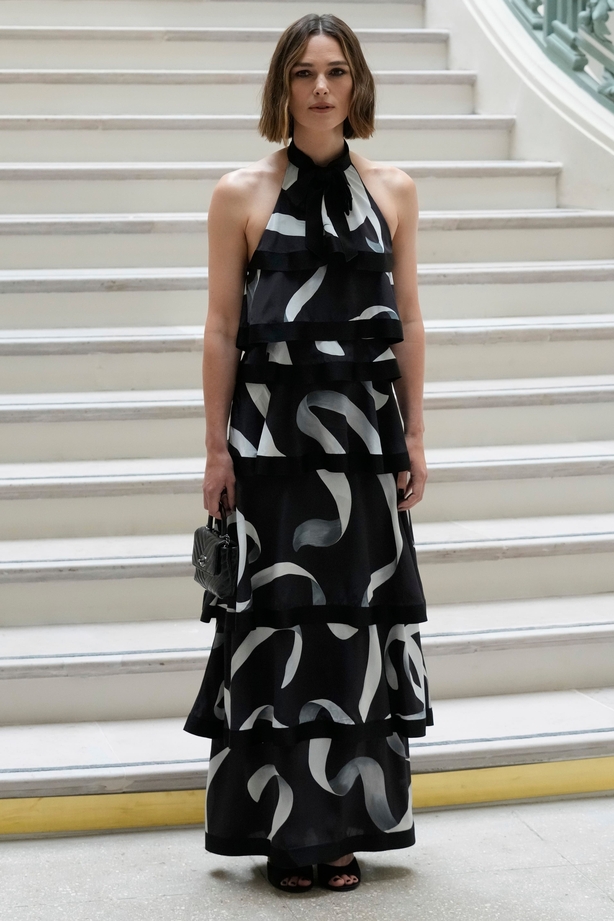 a person in a black and white dress