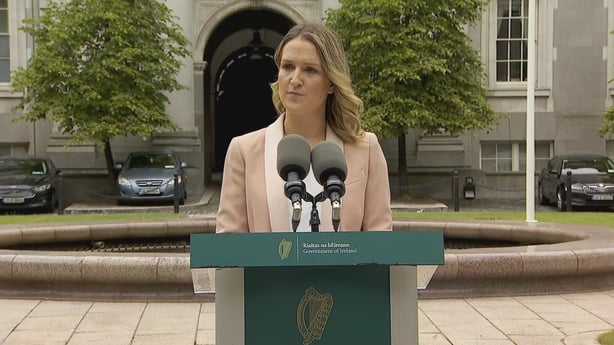 Helen McEntee speaking at a press conference.