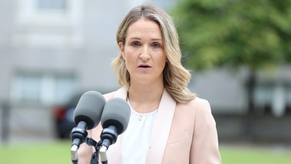 Helen McEntee speaking at a press conference.