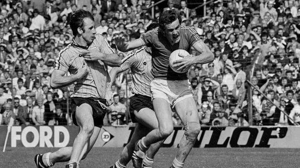 Colm O'Rourke of Meath is tackled by Mick Kennedy of Dublin - 1983 Leinster quarter-final
