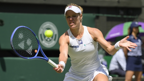 Laura Siegemund of Germany plays in the Ladies singles quarter-finals match against Aryna Sabalenka (not seen) during day nine of The Championships Wimbledon 2025 at All England Lawn Tennis and Croquet Club on July 08, 2025 in London, England.