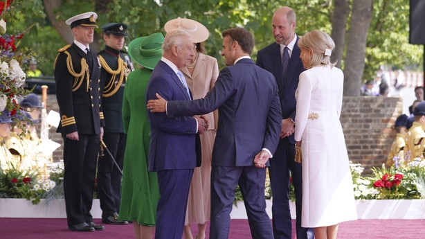 Britain's King Charles III and France's President Emmanuel Macron inspect the Guard of Honour during a ceremonial welcome at Windsor Castle, in Windsor west of London, on July 8, 2025, on the first day of a three-day state visit to Britain. French President Emmanuel Macron begans a three-day state v