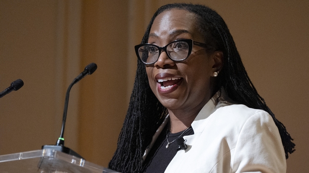 US Supreme Court Justice Ketanji Brown Jackson speaking at a podium