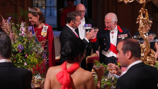 WINDSOR, ENGLAND - JULY 8: Catherine, Princess of Wales (L) looks on as King Charles III (R) and French President Emmanuel Macron (C) toast at a state banquet on July 8, 2025 in Windsor, England. Macron and wife Brigitte Macron are visiting the U.K. for the first official state visit by a French pre