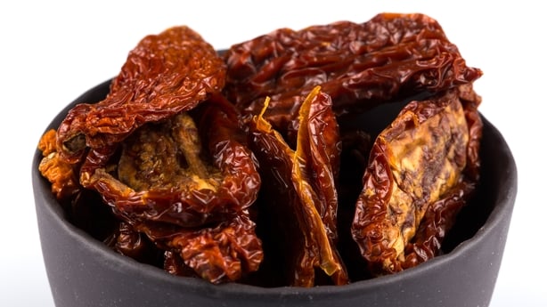 a bowl of dried tomatoes