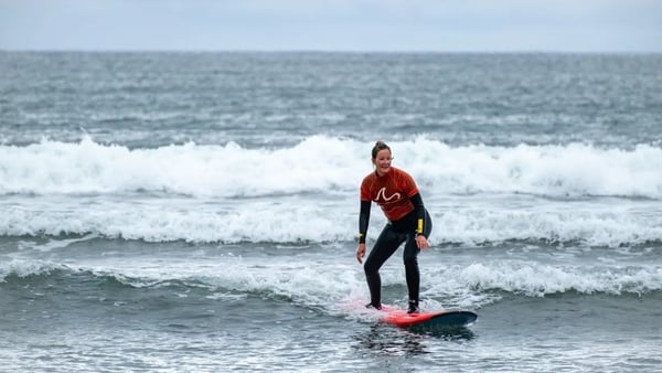 Ella surfing at Strandhill