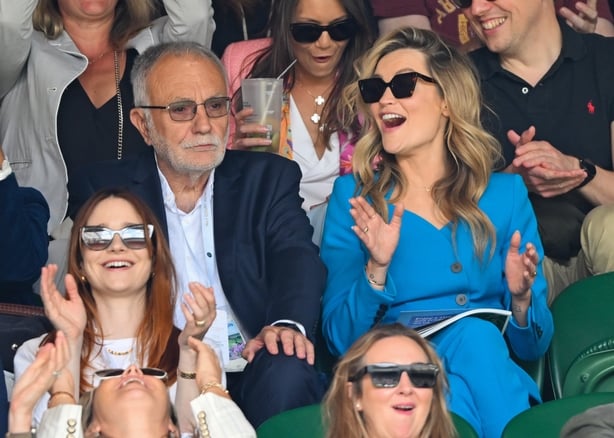 a group of people in sunglasses