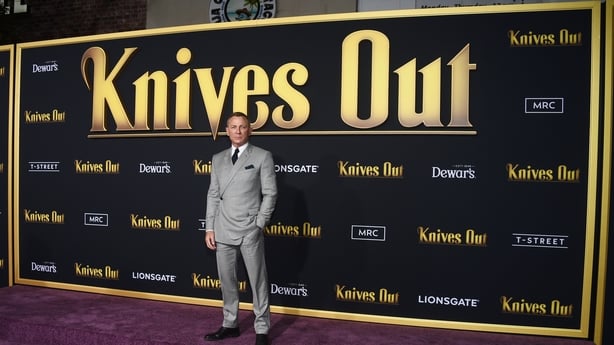 Daniel Craig arrives at the premiere of Lionsgate's "Knives Out" at the Regency Village Theatre on November 14, 2019 in Westwood, California