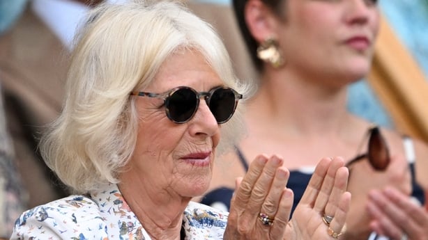 Britain's Queen Camilla applauds in the royal box of Centre Court ahead of the men's singles quarter-final tennis match between Serbia's Novak Djokovic and Italy's Flavio Cobolli on the tenth day of the 2025 Wimbledon Championships at The All England Lawn Tennis and Croquet Club in Wimbledon, southw