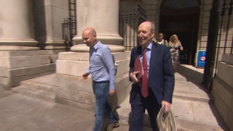 Former Senator and Independent Alliance TD Shane Ross and Paul Murphy TD pictured outside court
