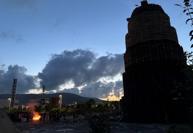 Crowds gather to protect the bonfire in south Belfast