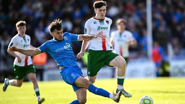 21 April 2025; Josh Fitzpatrick of Cork City is tackled by Grant Horton of Waterford during the SSE Airtricity Men's Premier Division match between Cork City and Waterford at Turners Cross in Cork. Photo by Seb Daly/Sportsfile