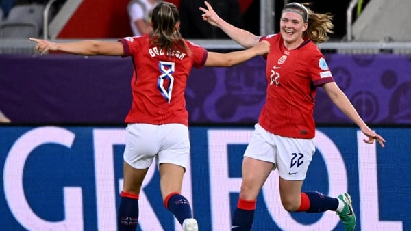 Norway's forward Signe Gaupset (R) after scoring her second goal against Iceland - Euro 2025