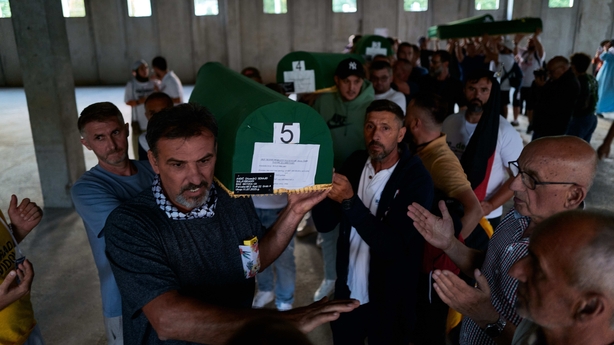 Coffins of seven Srebrenica genocide victims - (Photo by Pierre Crom/Getty Images)
