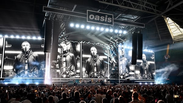 CARDIFF, WALES - JULY 04: (EDITORS NOTE: EDITORIAL USE ONLY. IMAGES MAY ONLY BE USED IN RELATION TO THE EVENT. NO COMMERCIAL USE. NO USE IN PUBLICATIONS SOLELY DEDICATED TO THE ARTIST. NO USE AFTER JULY 03, 2026.) Oasis perform on stage during the opening