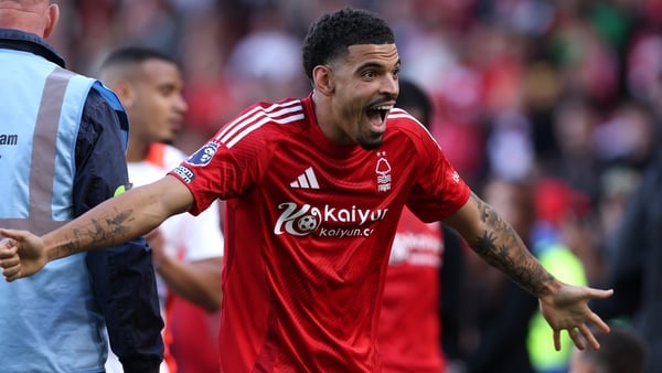 NOTTINGHAM, ENGLAND - MAY 25: Morgan Gibbs-White of Nottingham Forest reacts as his son Graysen joins him on the pitch after the Premier League match between Nottingham Forest FC and Chelsea FC at City Ground on May 25, 2025 in Nottingham, England. (Photo