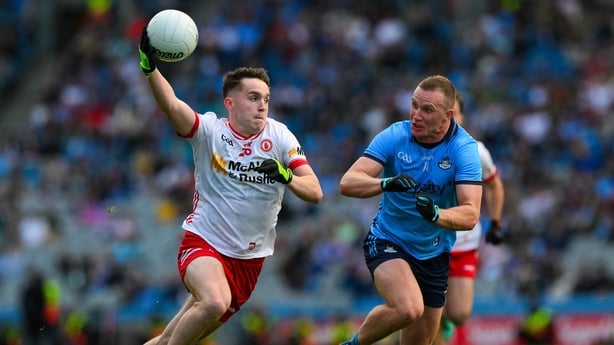 28 June 2025; Eoin McElholm of Tyrone in action against Ciarán Kilkenny of Dublin during the GAA Football All-Ireland Senior Championship quarter-final match between Dublin and Tyrone at Croke Park in Dublin. Photo by Ray McManus/Sportsfile