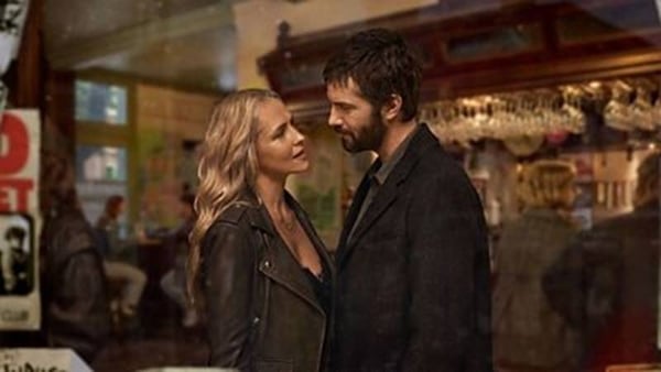 a person and person looking at each other