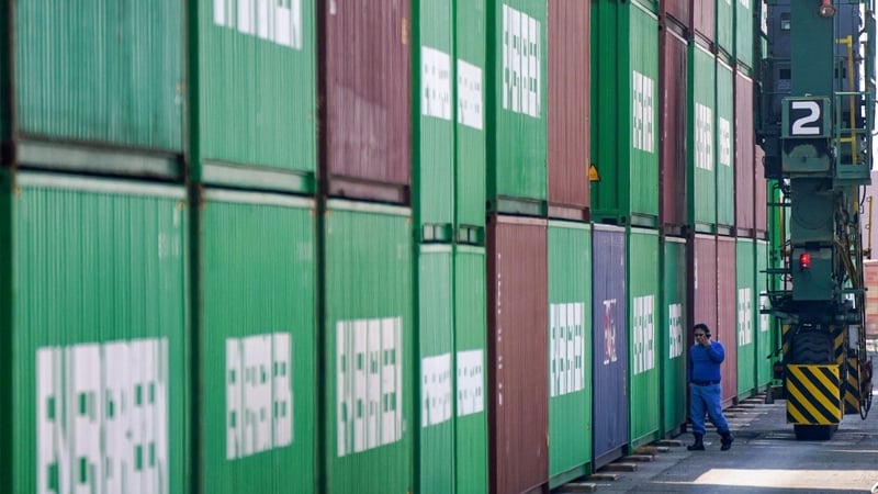 Stacked containers are seen at the international cargo terminal at the port of Tokyo