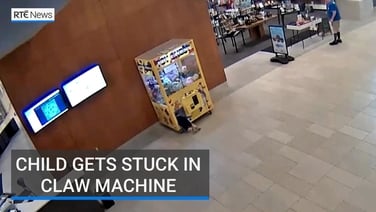 Child gets stuck in claw machine