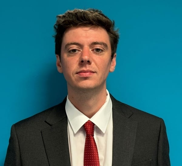 Photo byline for Gavin O'Callaghan who is in a suit and tie