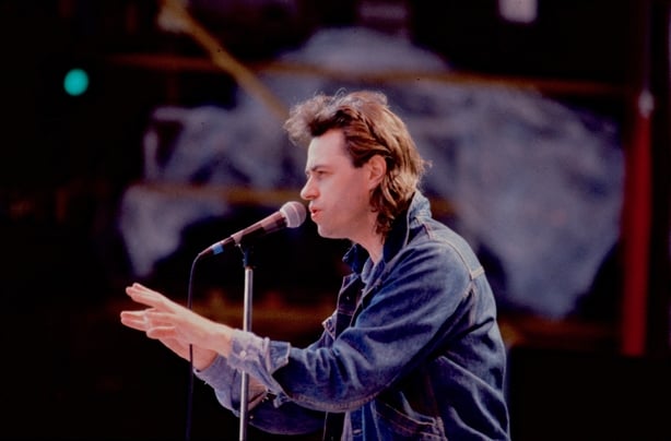 Irish Rock musician Bob Geldof, of the group the Boomtown Rats, performs onstage during the Live Aid benefit concert, Wembley Stadium, London, 7/13/1985. (Photo by Steve Rapport/Getty Images)