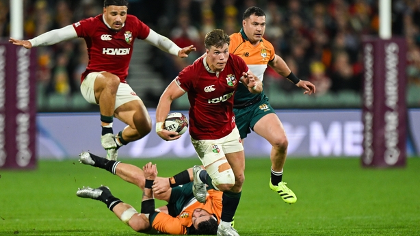 12 July 2025; Huw Jones of British & Irish Lions, supported by Sione Tuipulotu, makes a break during the tour match between AUNZ XV and the British & Irish Lions at the Adelaide Oval in Adelaide, Australia. Photo by Brendan Moran/Sportsfile