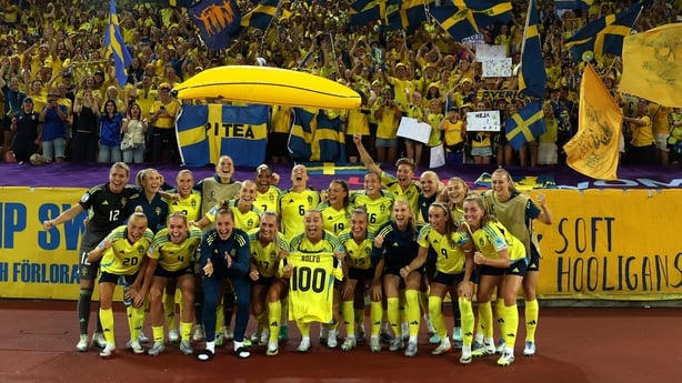 Fridolina Rolfo of Sweden poses for a photo with team mates and fans while holding a shirt which reads "Rolfo, 100" in celebration of her 100th appearance for the national team after the UEFA Women's EURO 2025 Group C match between Sweden and Germany at Stadion Letzigrund on July 12, 2025 in Zurich,