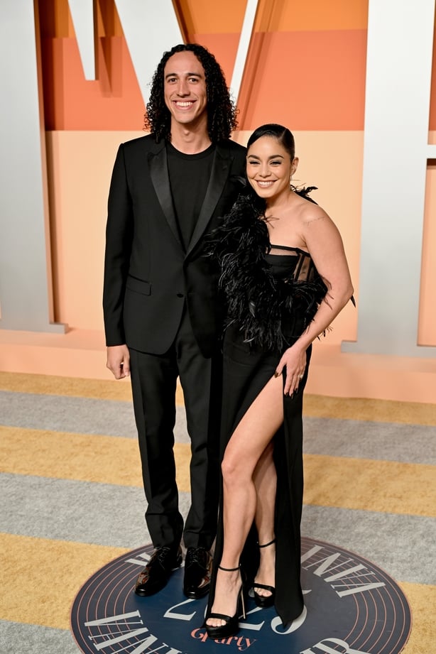 Cole Tucker and Vanessa Hudgens attend the 2025 Vanity Fair Oscar Party at Wallis Annenberg Center for the Performing Arts on March 02, 2025 in Beverly Hills, California