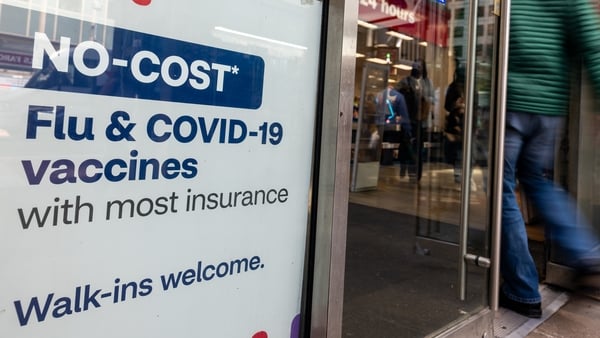 A sign in a pharmacy advertises the COVID-19 vaccine in New York City