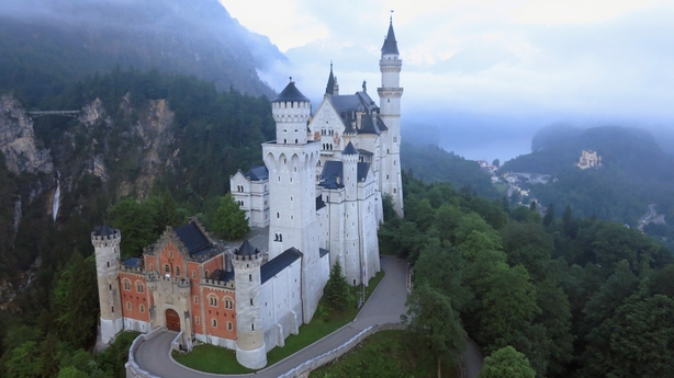  neuschwanstein castle with trees around it 