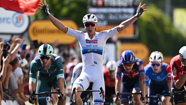 CHATEAUROUX, FRANCE - JULY 13: Tim Merlier of Belgium and Team Soudal Quick-Step celebrates at finish line as stage winner ahead of Jonathan Milan of Italy and Team Lidl - Trek - Green Sprint Jersey during the 112th Tour de France 2025, Stage 9 a 174.1km